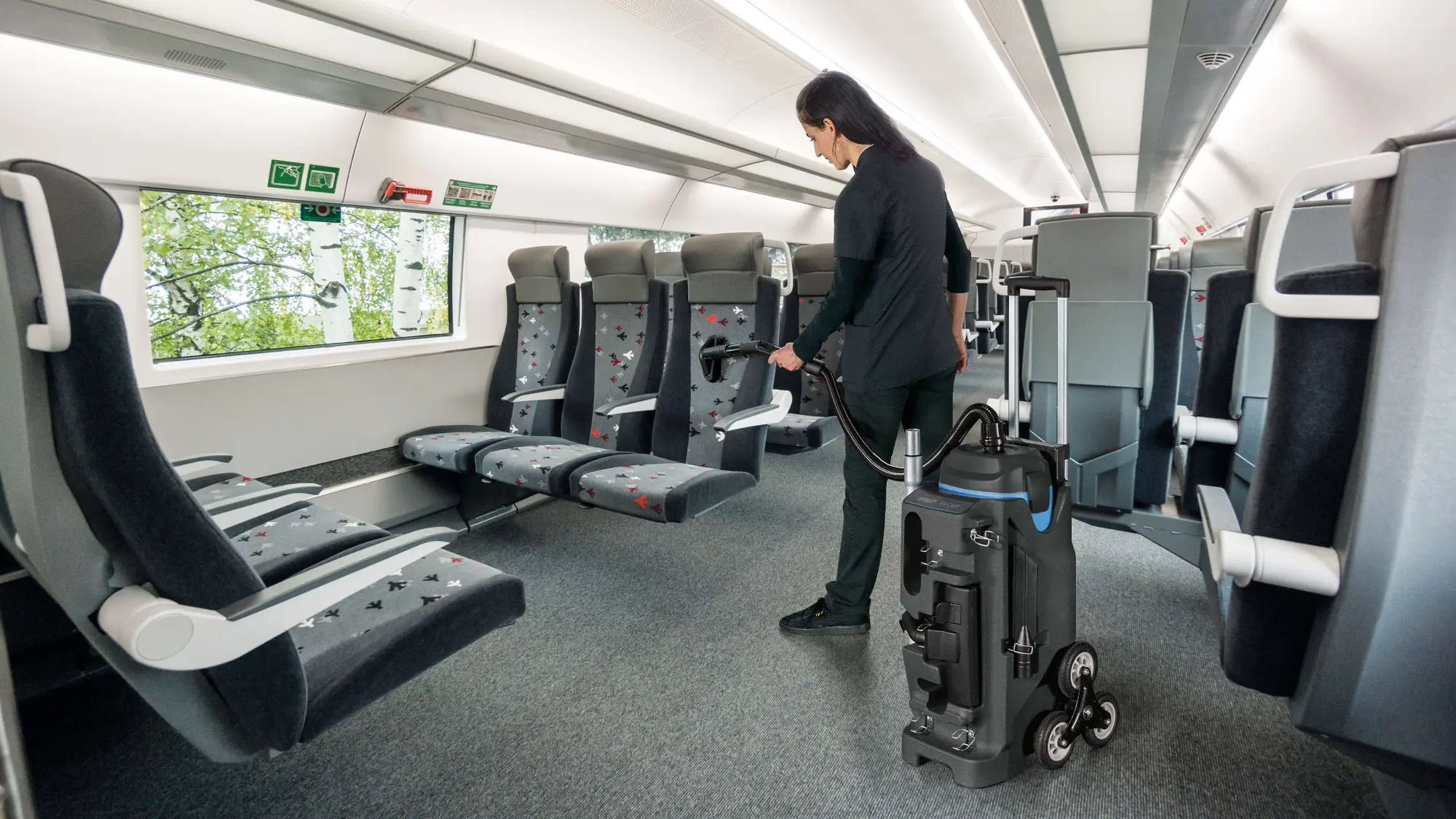 Fimap vacuum cleaning seats in a train carriage