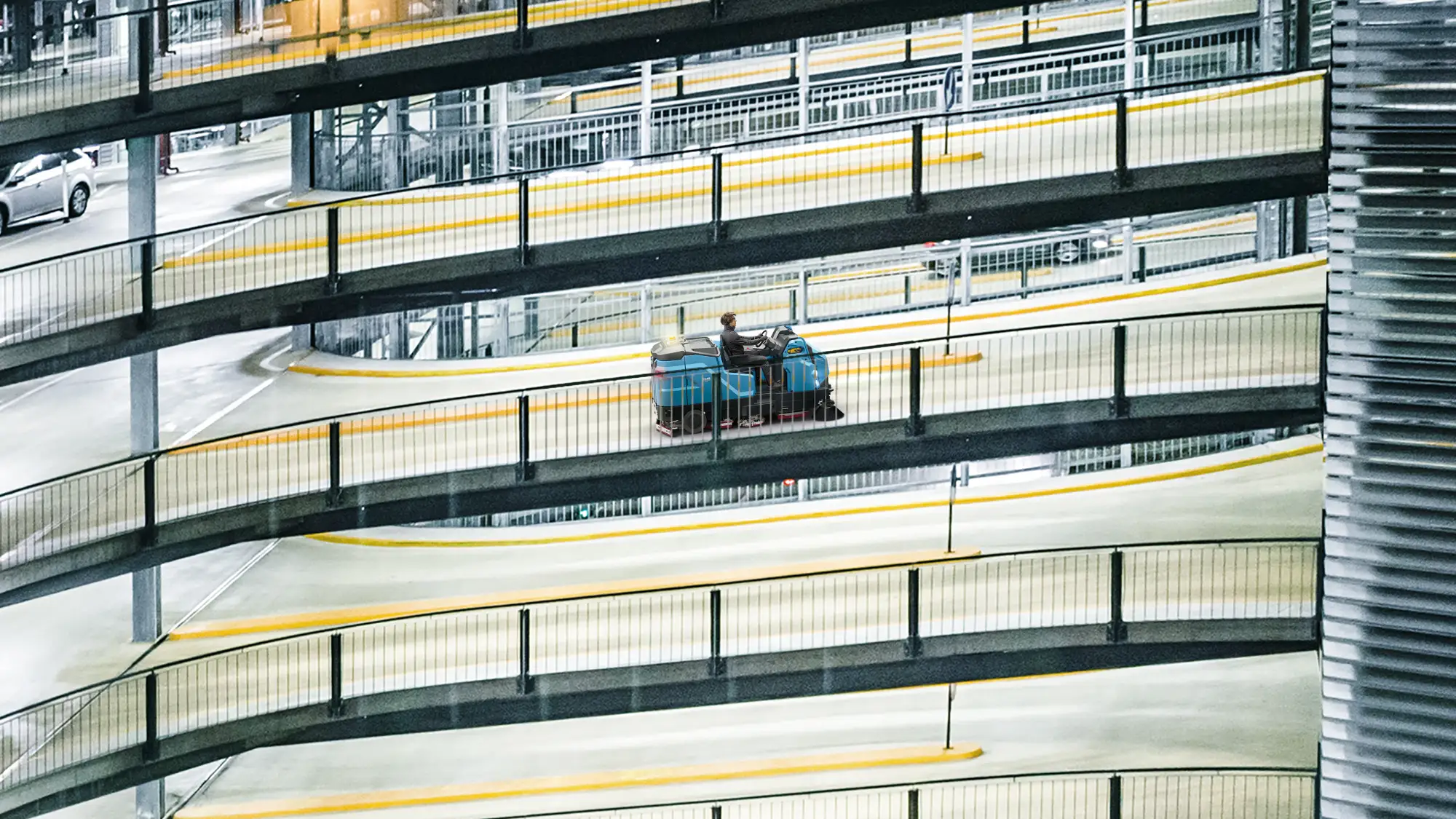Fimap GMG ride-on machine on a multi-level car park ramp